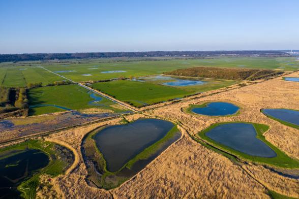 Vue aérienne de la zone humide implantée sur l'ex site Millennium Inorganic Chemicals (MIC) au cœur de l’estuaire au Hode près du Havre - Enlarge image, modal window